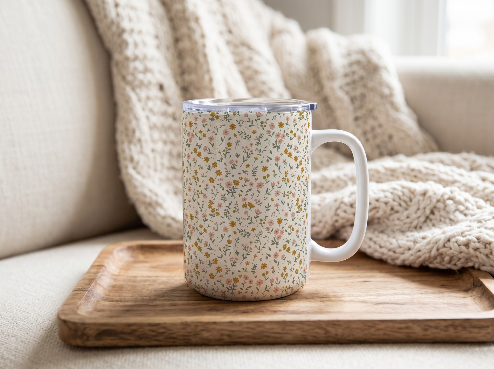 15 oz Mug Tumbler with Handle on a Cosy Sofa Tray showing a ditsy wildflower pattern