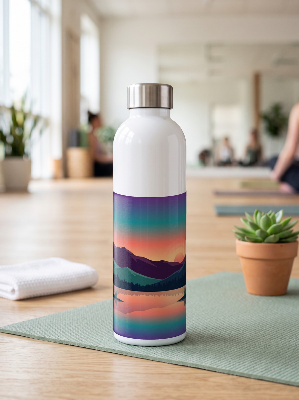 17 oz Water Bottle in a Yoga Studio showing a mountain sunset panorama wrap
