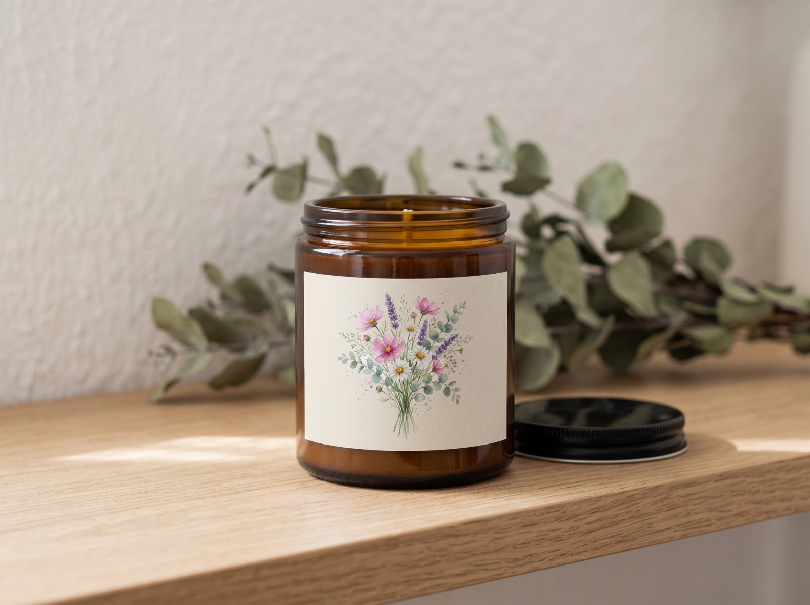 Amber Candle Jar Label on an Oak Shelf showing a watercolour wildflower bouquet