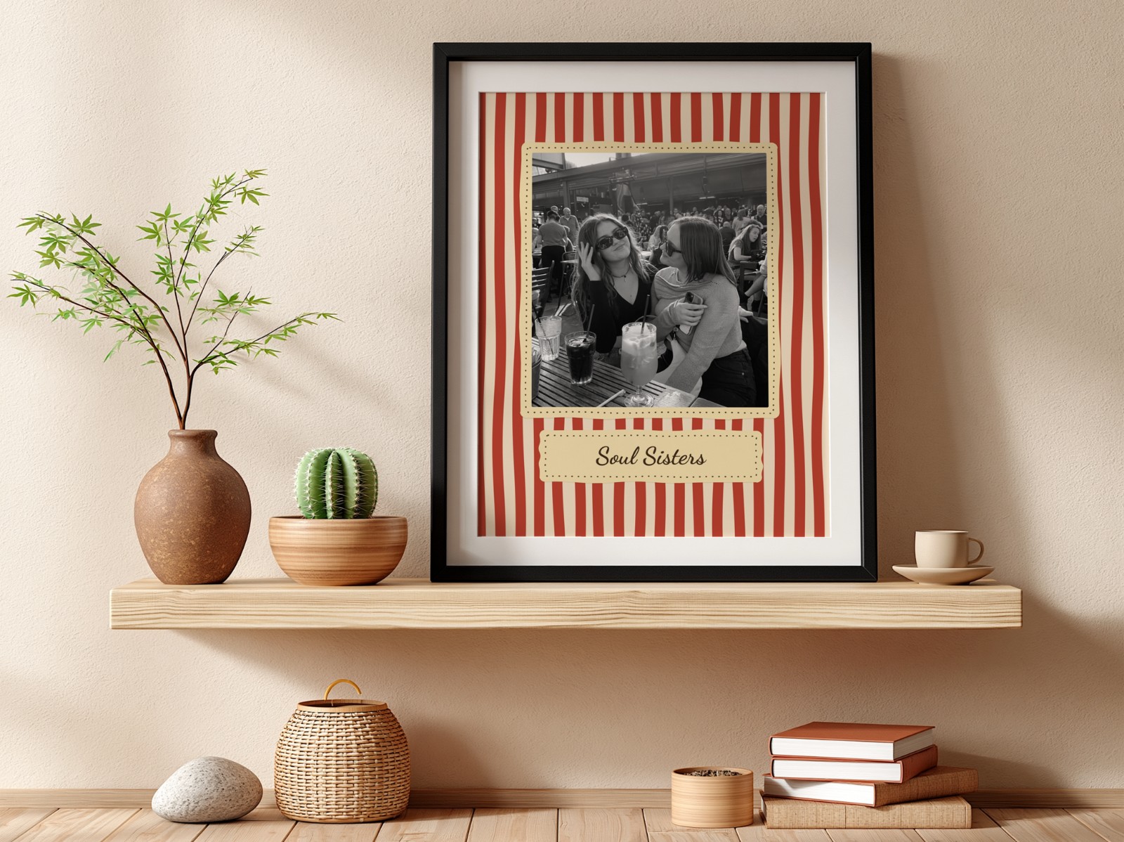Black Frame on Wooden Shelf, Beige Wall showing a retro Soul Sisters print