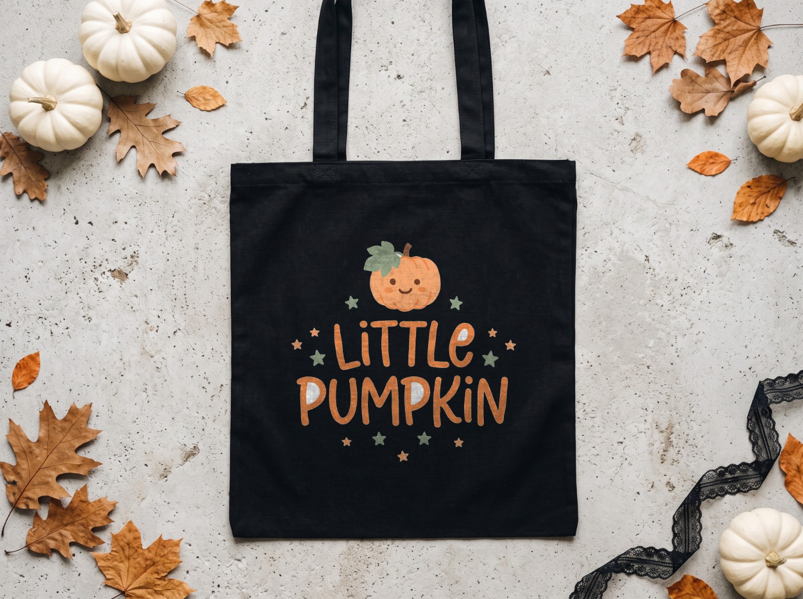 Black Tote Bag Halloween Flat Lay with White Pumpkins showing a cute Little Pumpkin design