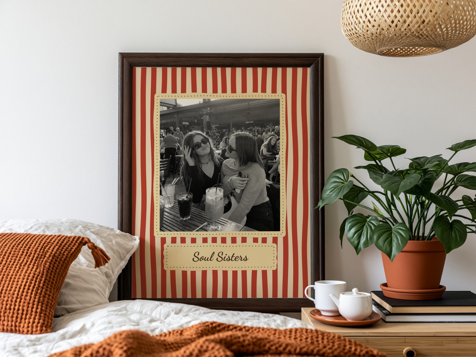 Dark Wood Frame Above Bed with Plant showing a retro Soul Sisters print