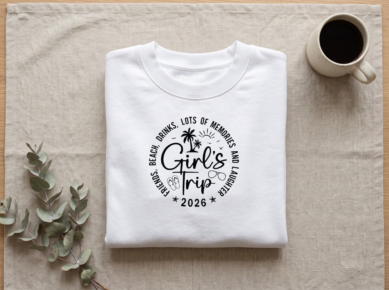 Folded White Sweatshirt Mockup on Linen with Eucalyptus example