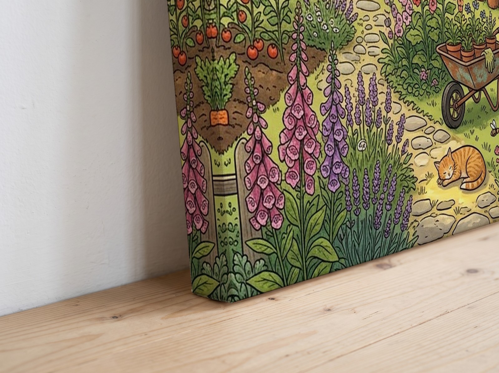 Corner close-up of a mirror edge canvas with an illustrated garden print on a wooden floor