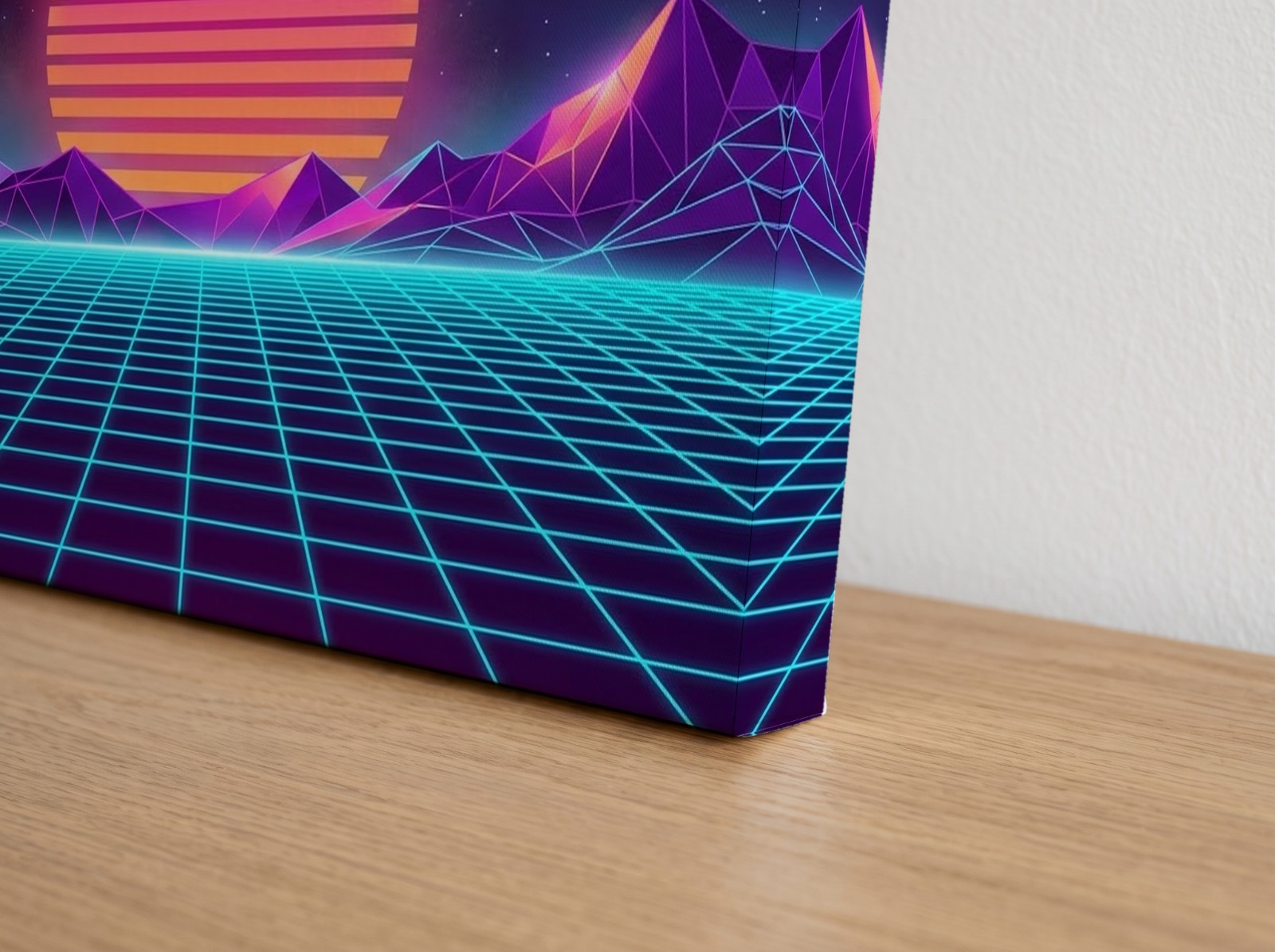 Corner close-up of a mirror edge gallery wrap canvas with a neon synthwave print on an oak sideboard