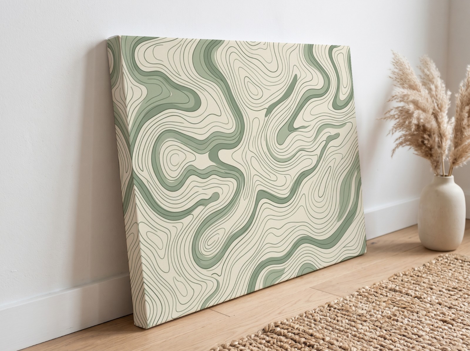 Gallery Wrap Canvas with a 1.25" Mirror Edge Leaning on a Wooden Floor showing a sage topographic map pattern