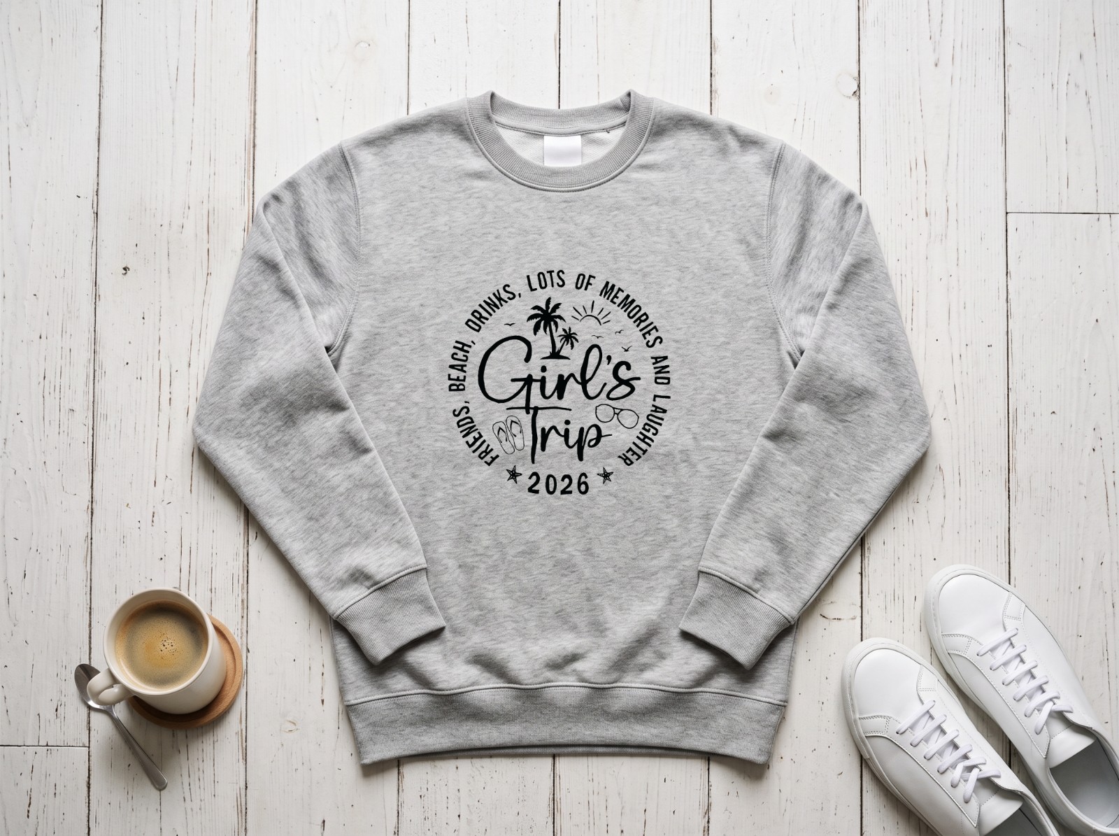 Heather Grey Sweatshirt Flat Lay on a White Wood Floor showing the Girl's Trip 2026 design