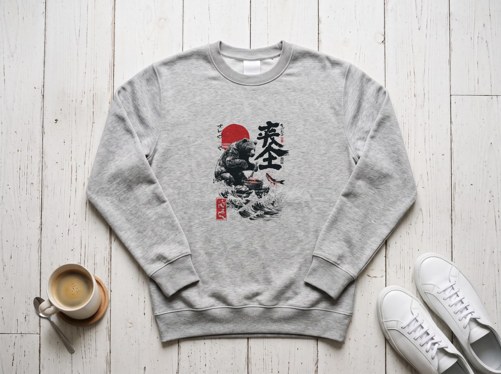 Heather Grey Sweatshirt Flat Lay on a White Wood Floor showing the Japanese bear design