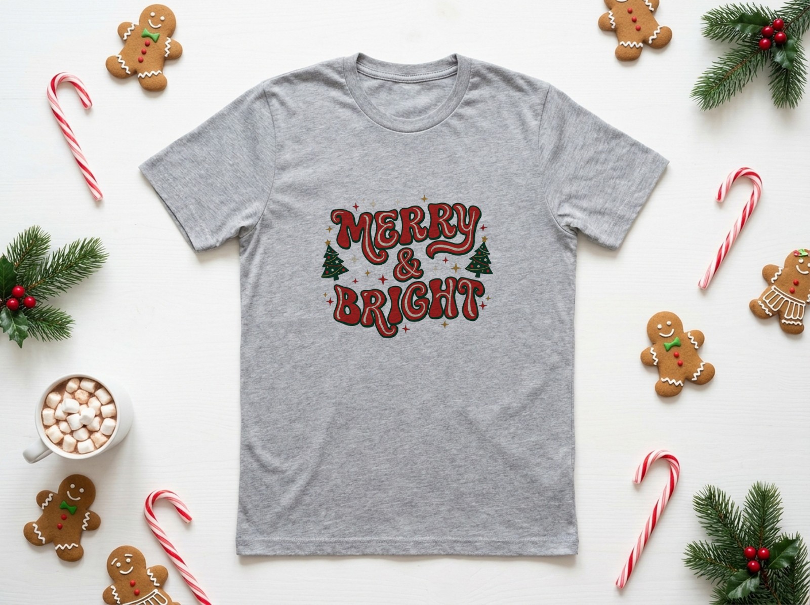 Heather Grey T-Shirt Christmas Flat Lay with Gingerbread and Candy Canes showing a retro Merry & Bright design