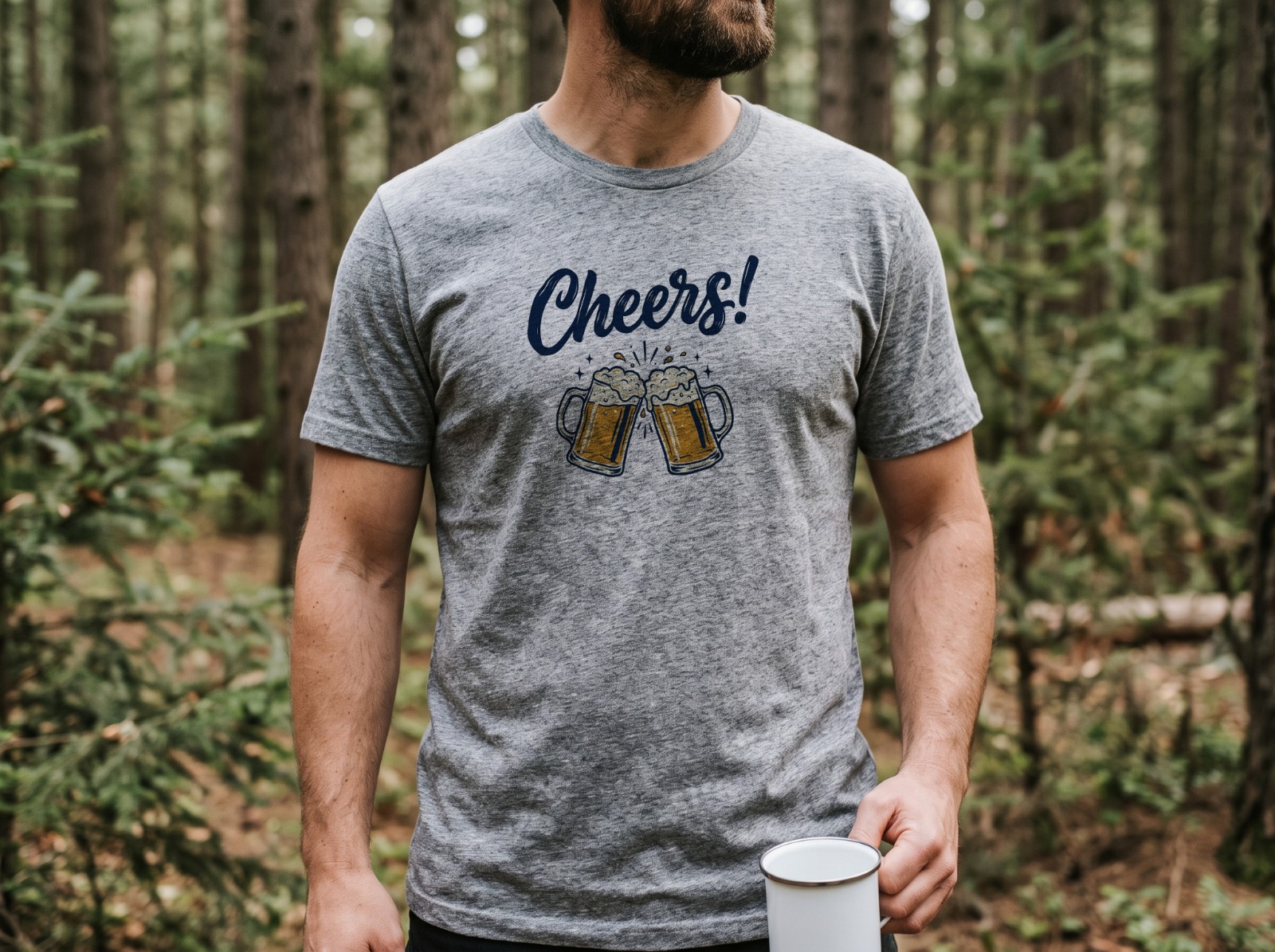 Heather Grey T-Shirt on a Man in a Pine Forest showing a Cheers lettering design
