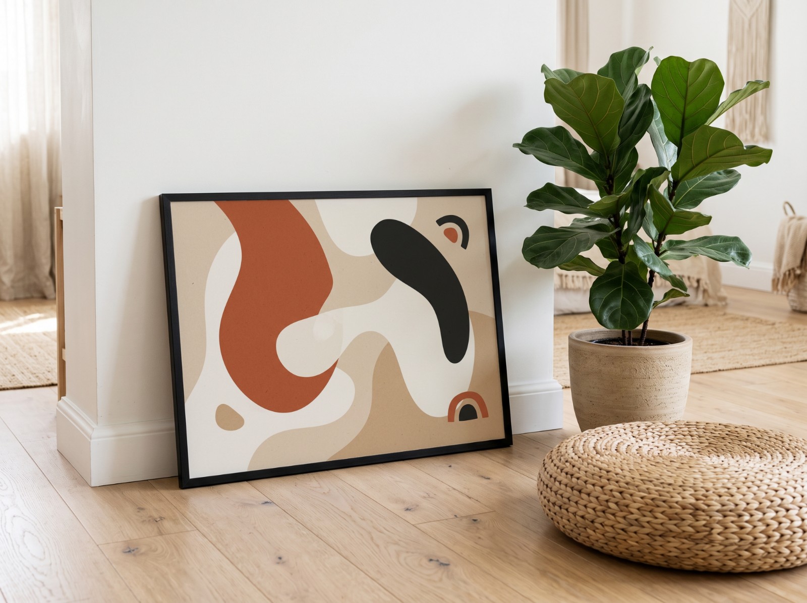 Landscape Black Frame Leaning on Floor showing a terracotta and black abstract print