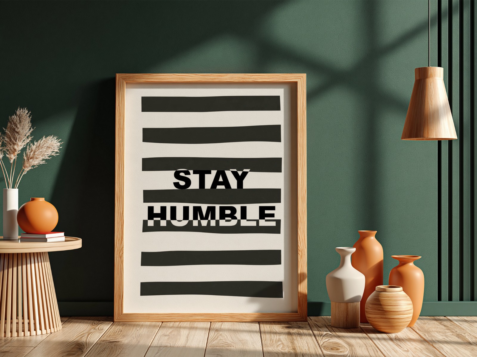 Oak Frame on Dark Green Wall with Vases showing a Stay Humble typography print