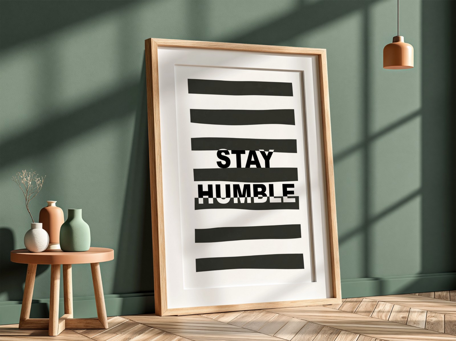 Oak Frame with Mat on Sage Green Wall showing a Stay Humble typography print