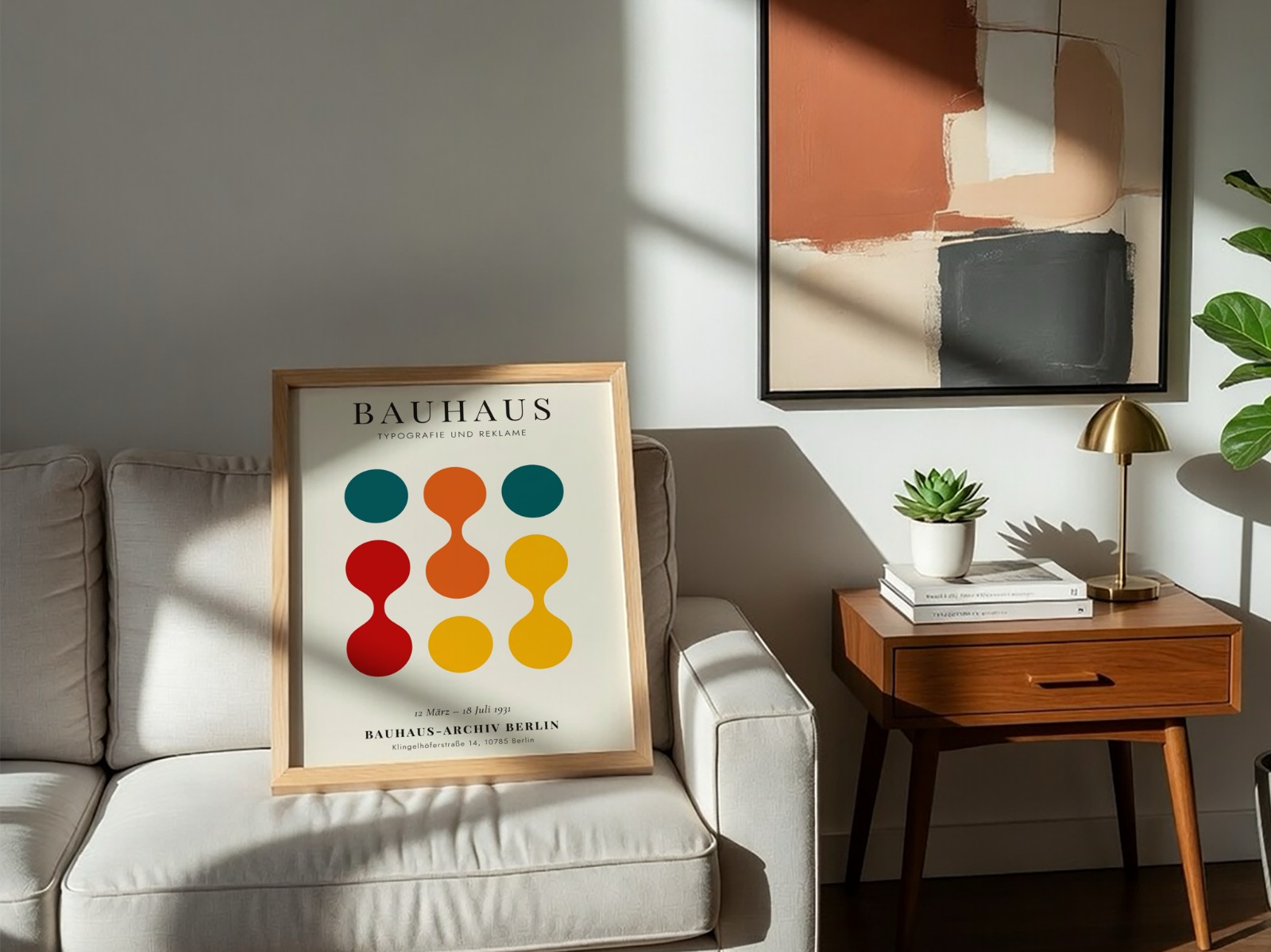 Oak Frame on Sofa with Abstract Art showing a Bauhaus circles print