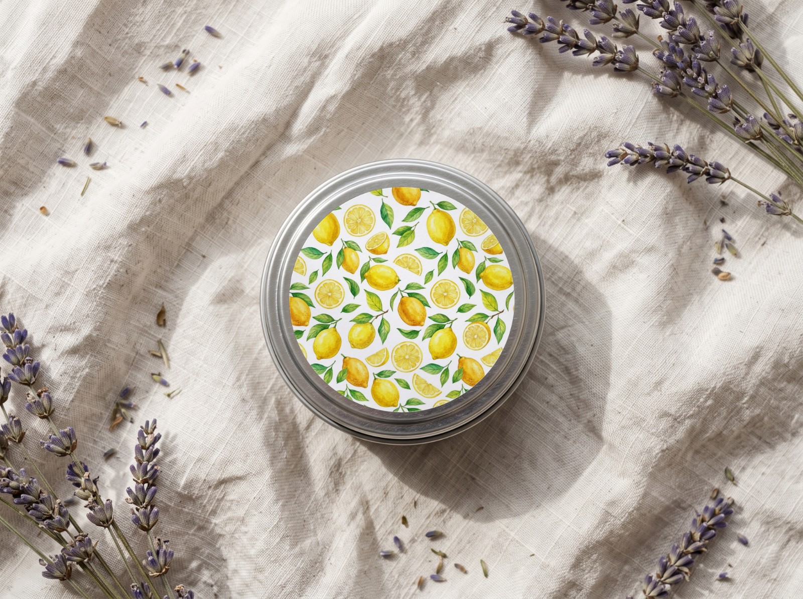 Round Candle Tin Lid Label on Linen showing a watercolour lemon pattern
