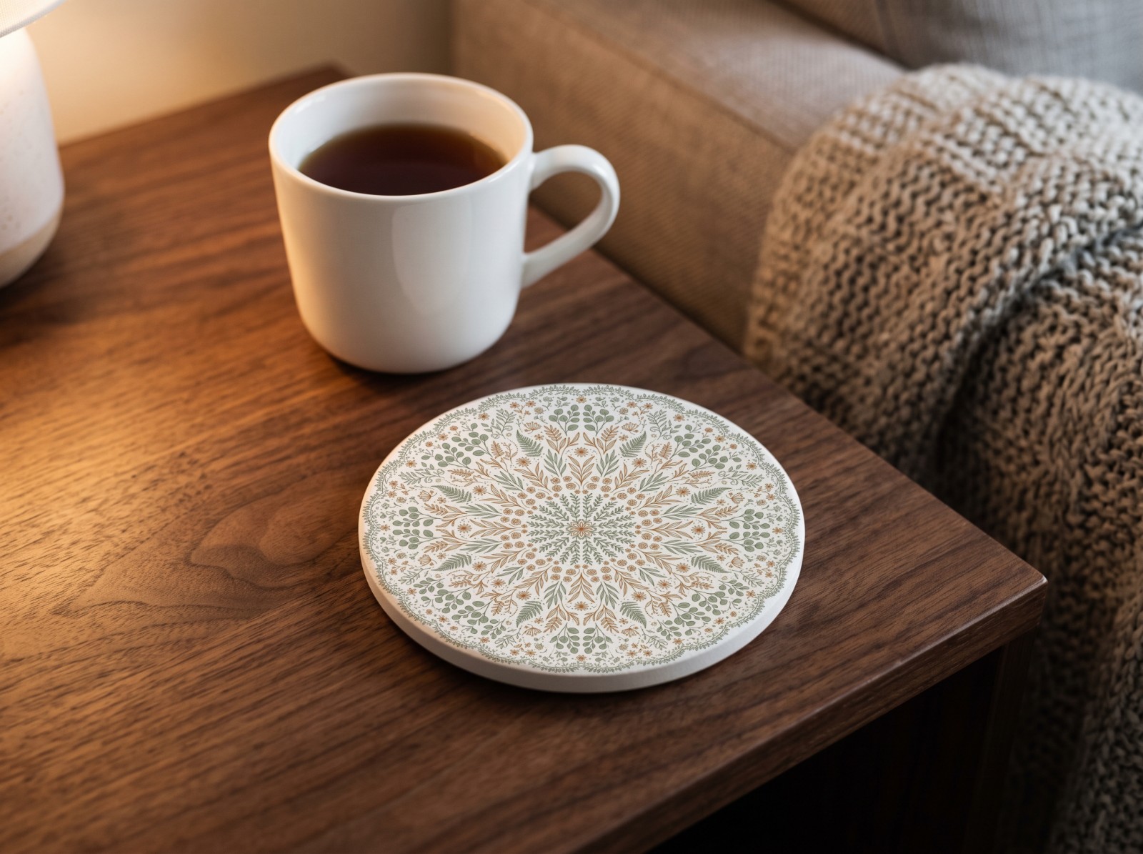 Round Sandstone Coaster Mockup on a Walnut Side Table with Tea example