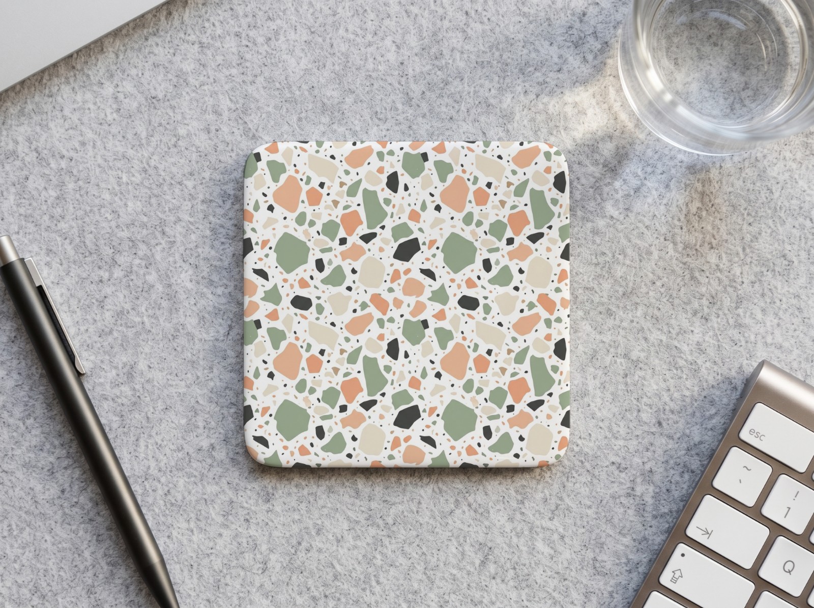 Square White Coaster on a Felt Desk Mat showing a pastel terrazzo pattern