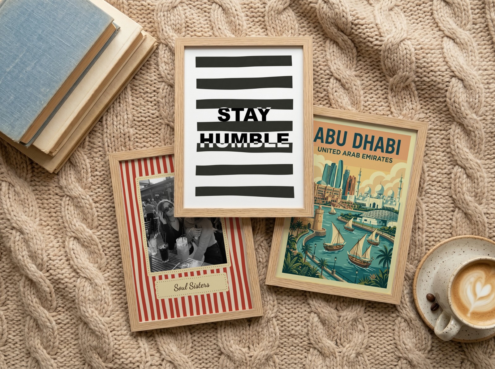 Three Oak Frames on Cable Knit Blanket showing a Stay Humble typography print, a retro Soul Sisters print and 1 more design