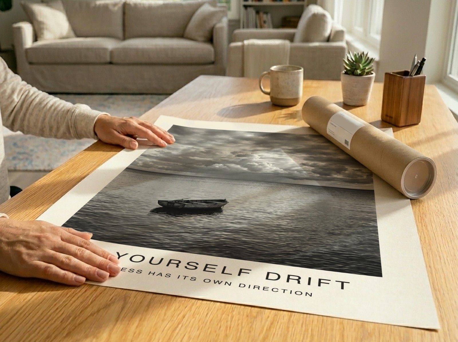 Unframed Poster Unrolled on Wooden Table showing a black and white seascape print