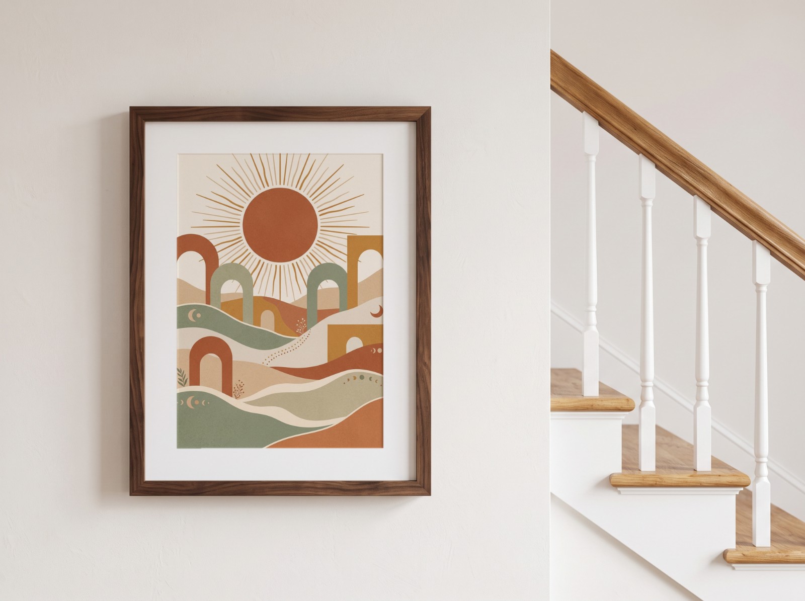Walnut Frame with a White Mat beside a Staircase showing a boho sun wall art