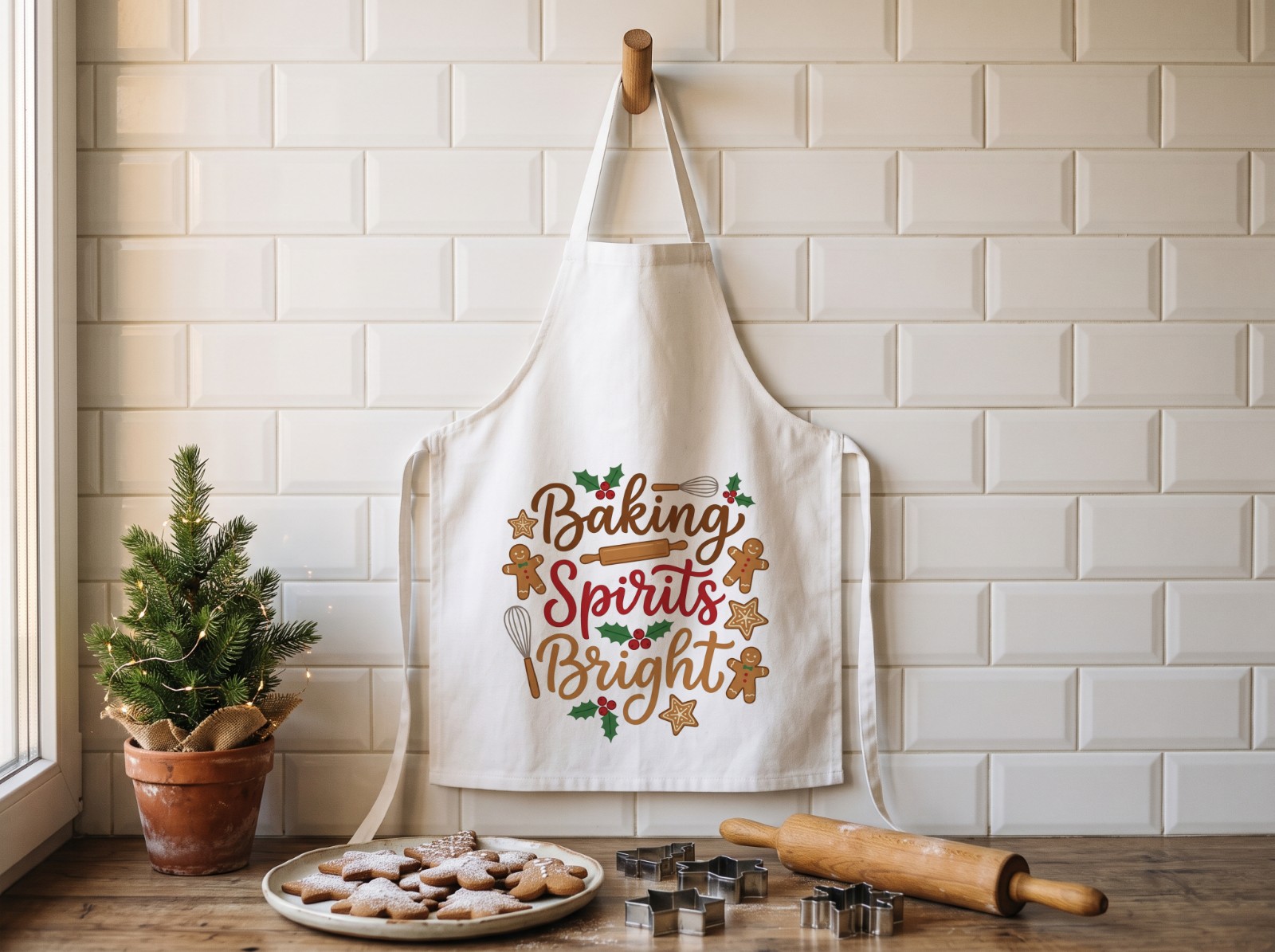 White Apron Christmas in a Baking Kitchen with Gingerbread showing a Baking Spirits Bright design