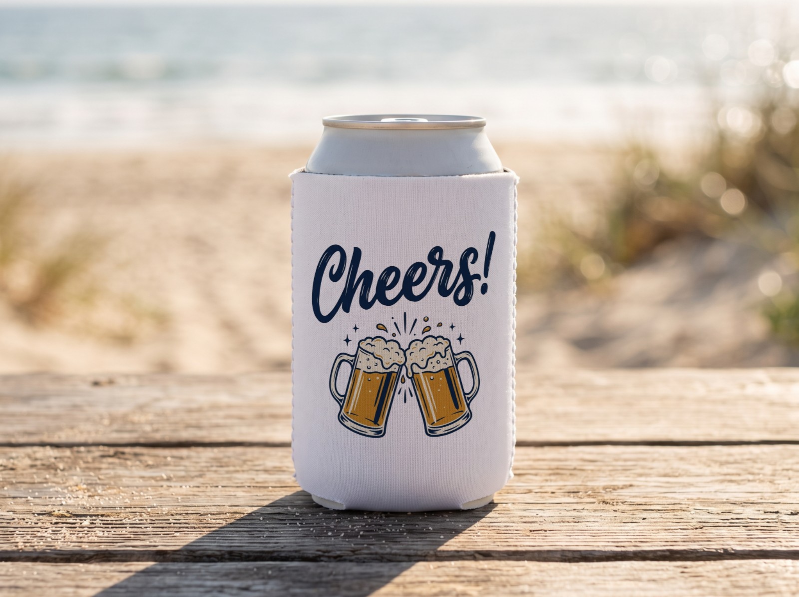 White Can Cooler on a Beach Table showing a Cheers lettering design