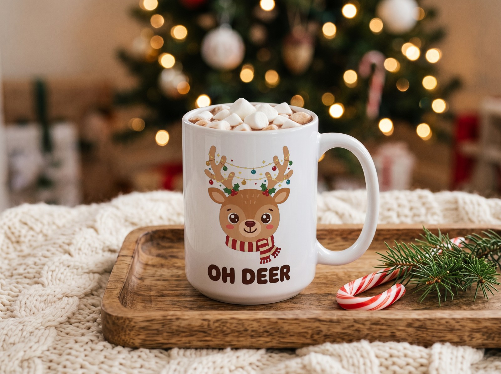 White Christmas Mug with Hot Cocoa and Marshmallows by the Tree showing a cute Oh Deer reindeer design