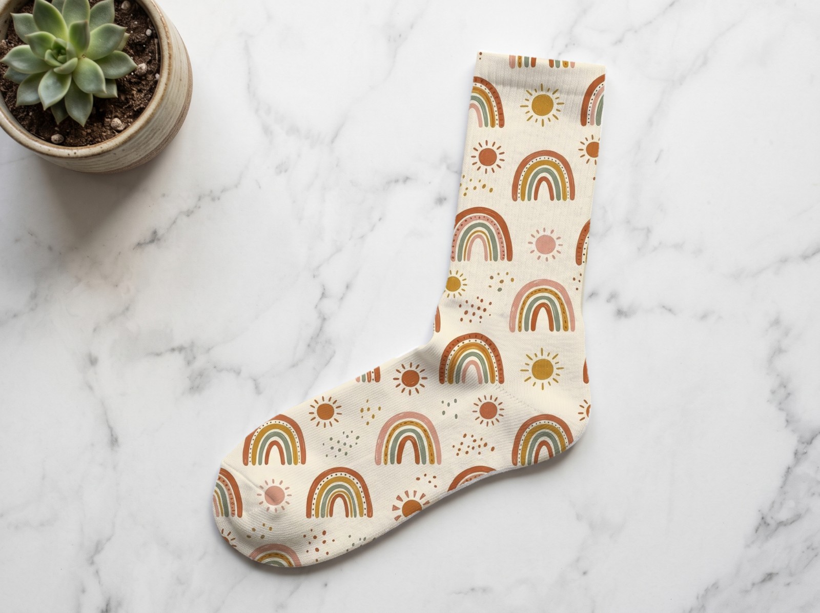 White Crew Sock Flat Lay on Marble showing a boho rainbow pattern