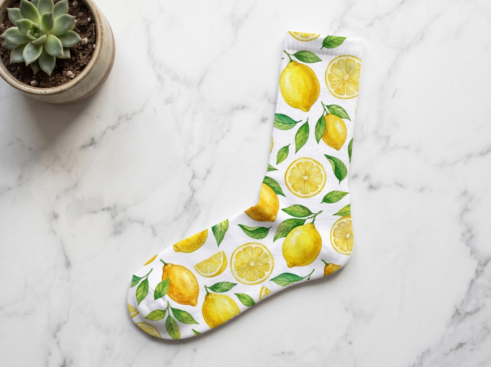 White Crew Sock Flat Lay on Marble showing a watercolour lemon pattern