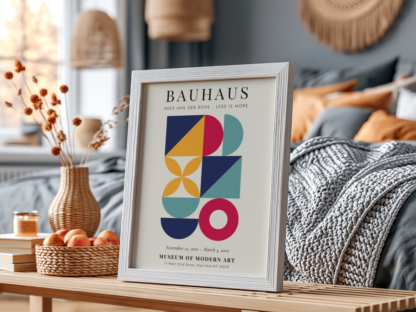 White Frame on Table in Cosy Bedroom showing a Bauhaus geometric print