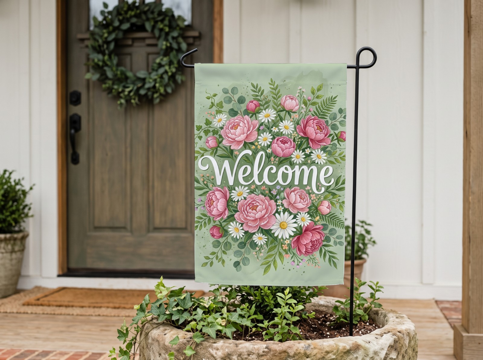 White Garden Flag by a Farmhouse Front Door showing a floral Welcome flag design