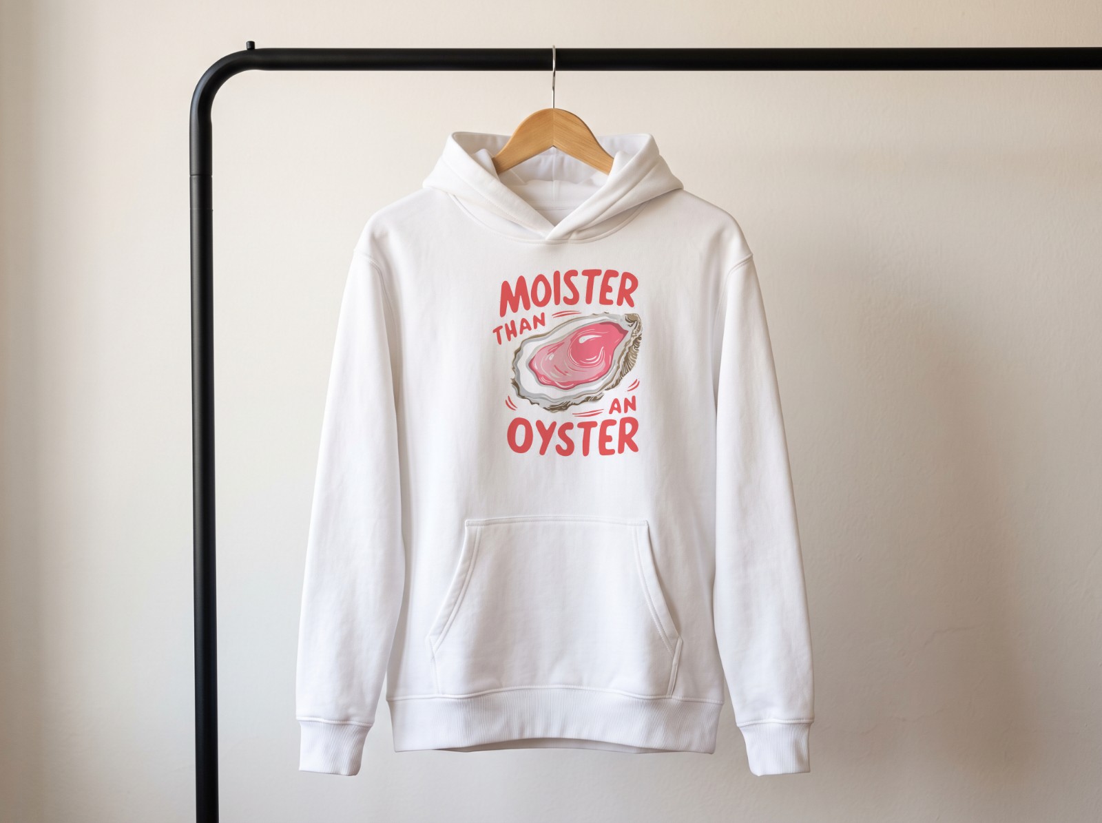White Hoodie on a Hanger on a Clothing Rail showing the Moister Than an Oyster design