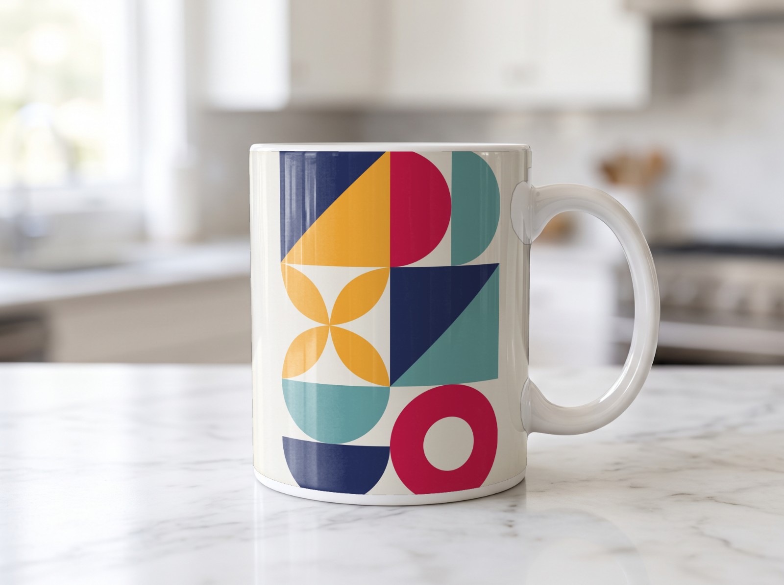 White Mug on a Marble Kitchen Counter showing a Bauhaus Less is More print