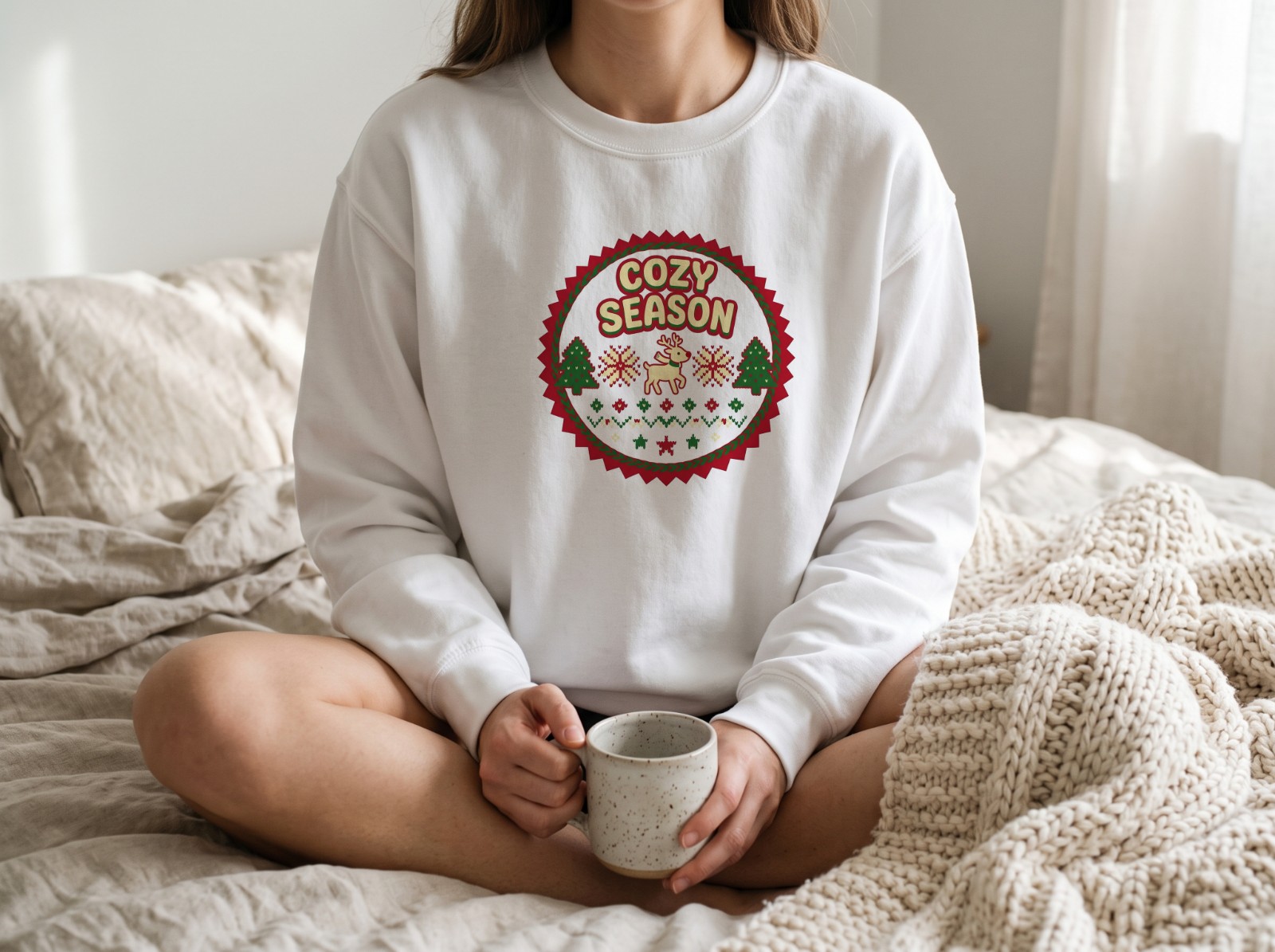 White Sweatshirt Mockup on a Woman Sitting on a Cosy Bed example