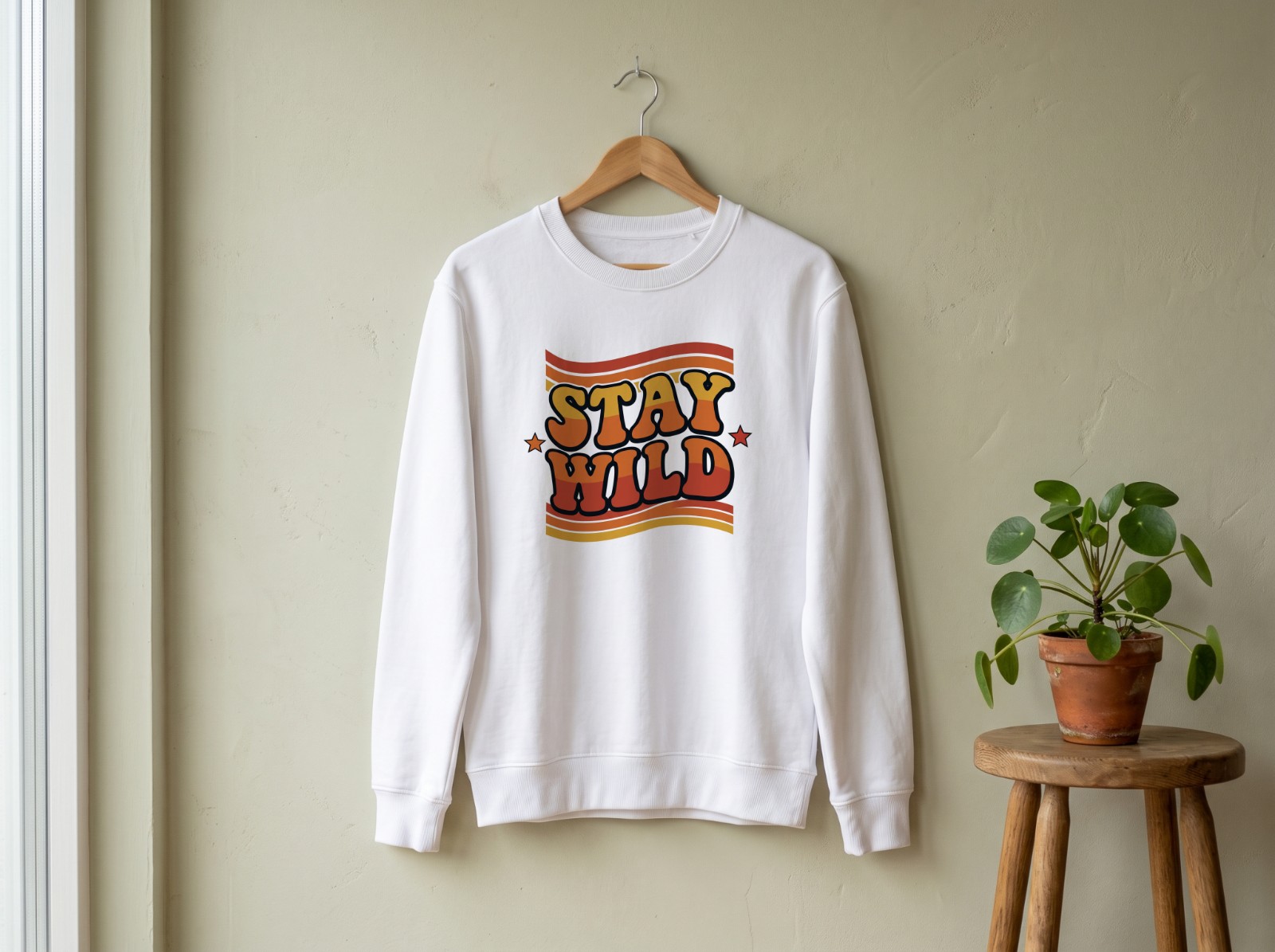 White Sweatshirt on a Wooden Hanger Mockup example