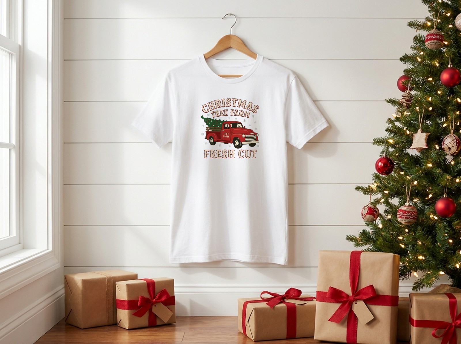 White T-Shirt Christmas Mockup on a Hanger by a Christmas Tree example