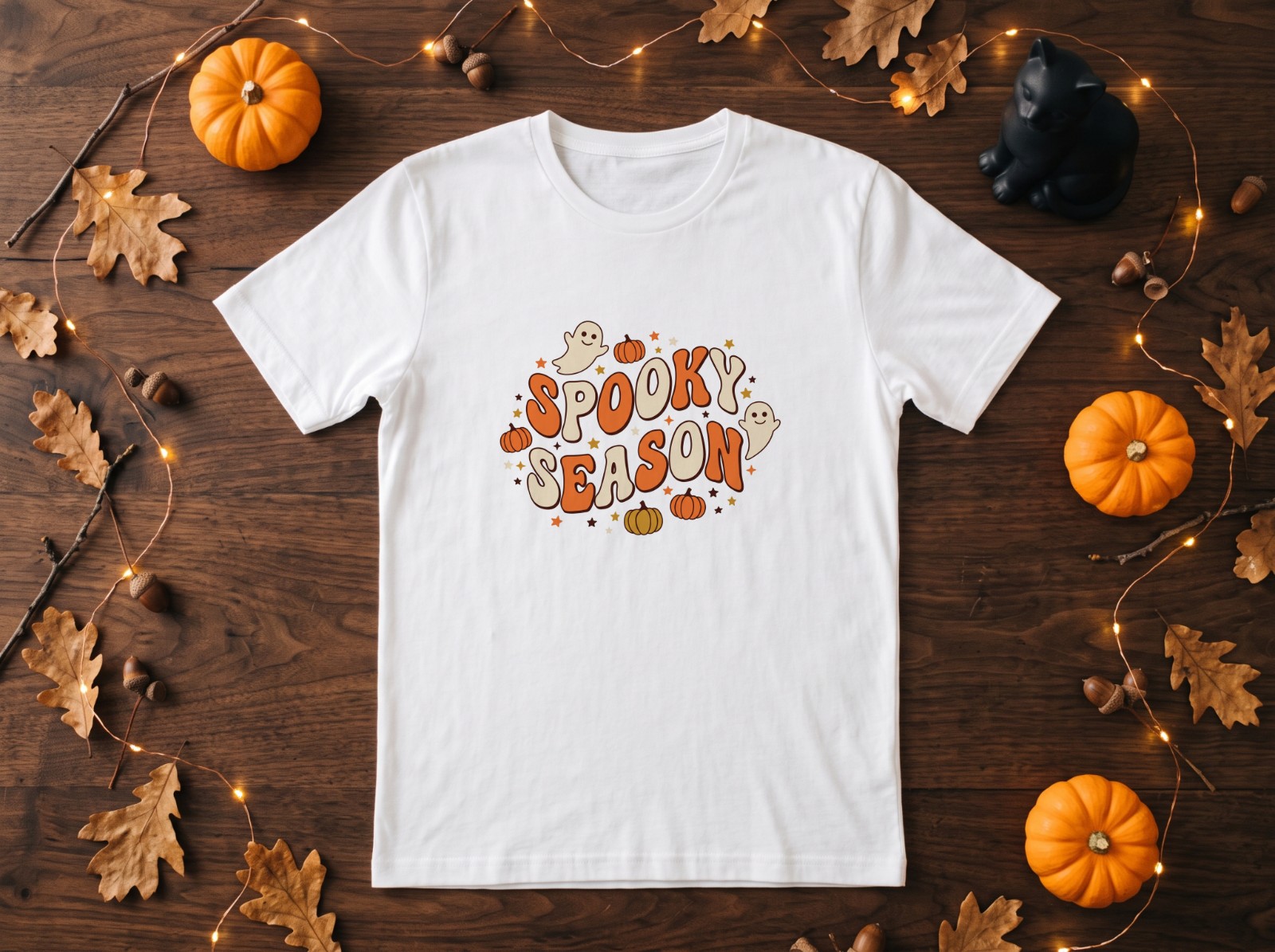 White T-Shirt Halloween Mockup Flat Lay with Black Cat and Pumpkins example