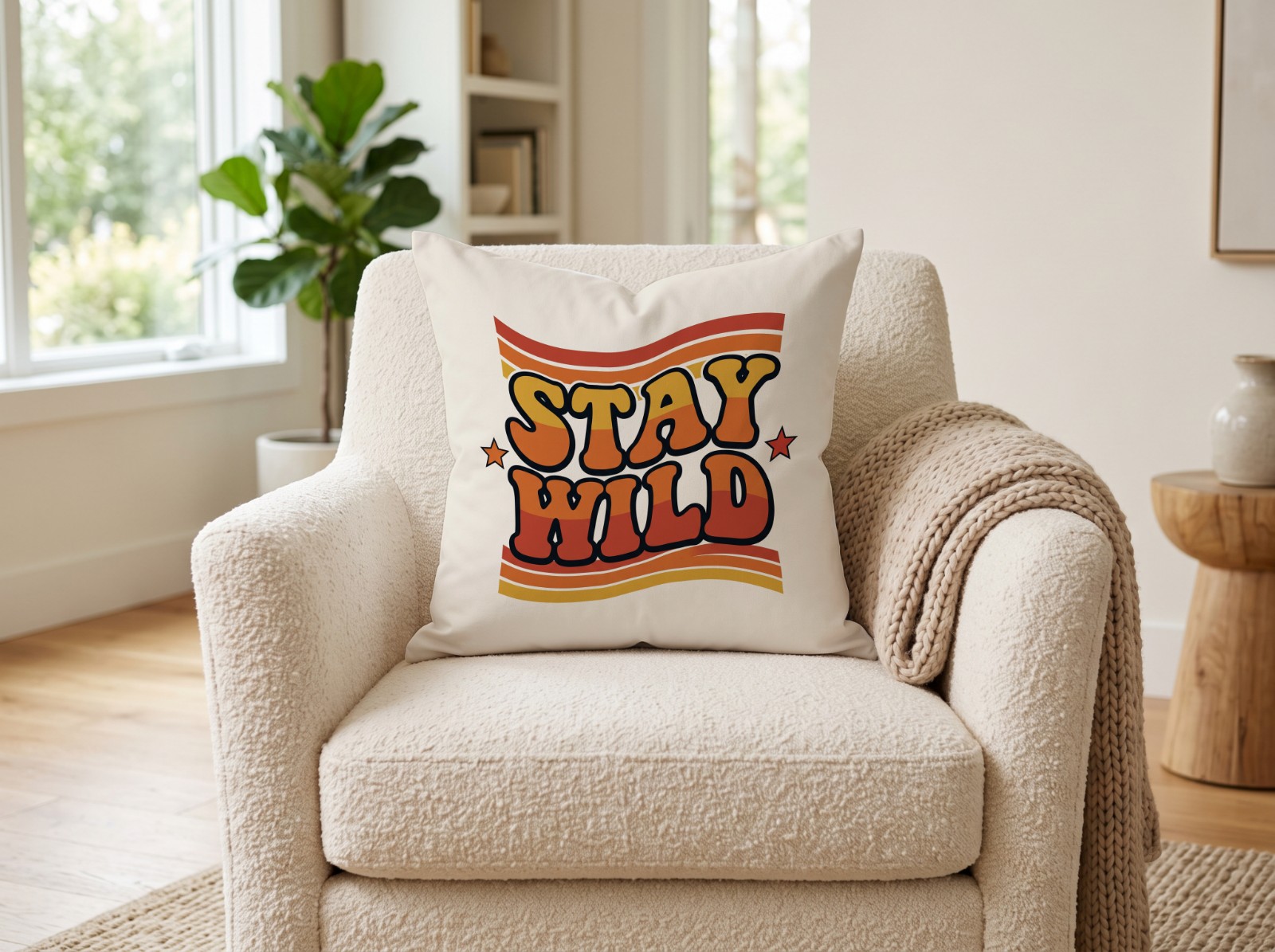 White Throw Pillow on a Boucle Armchair showing the retro Stay Wild design