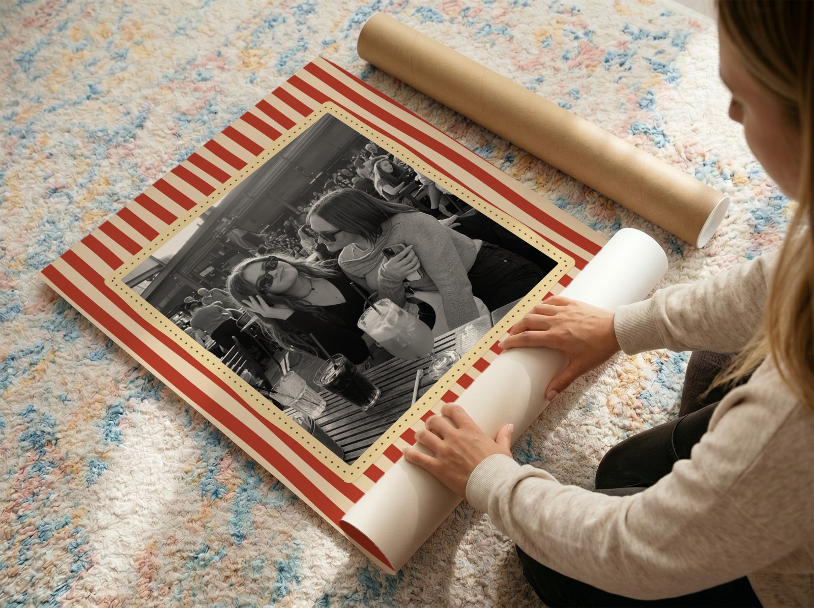 Woman Unrolling Poster on Colourful Rug showing a retro Soul Sisters print
