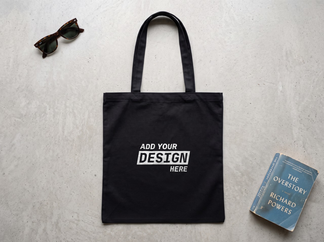 Black Tote Bag Flat Lay on Concrete