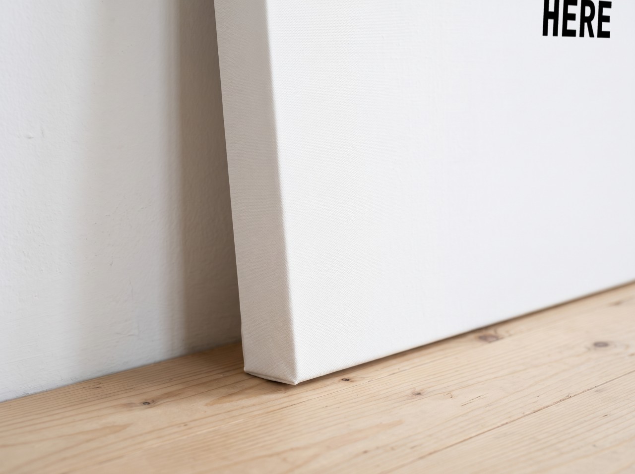 Gallery Wrap Canvas Mockup Corner Close Up with a 1.25" Mirror Edge on a Wooden Floor
