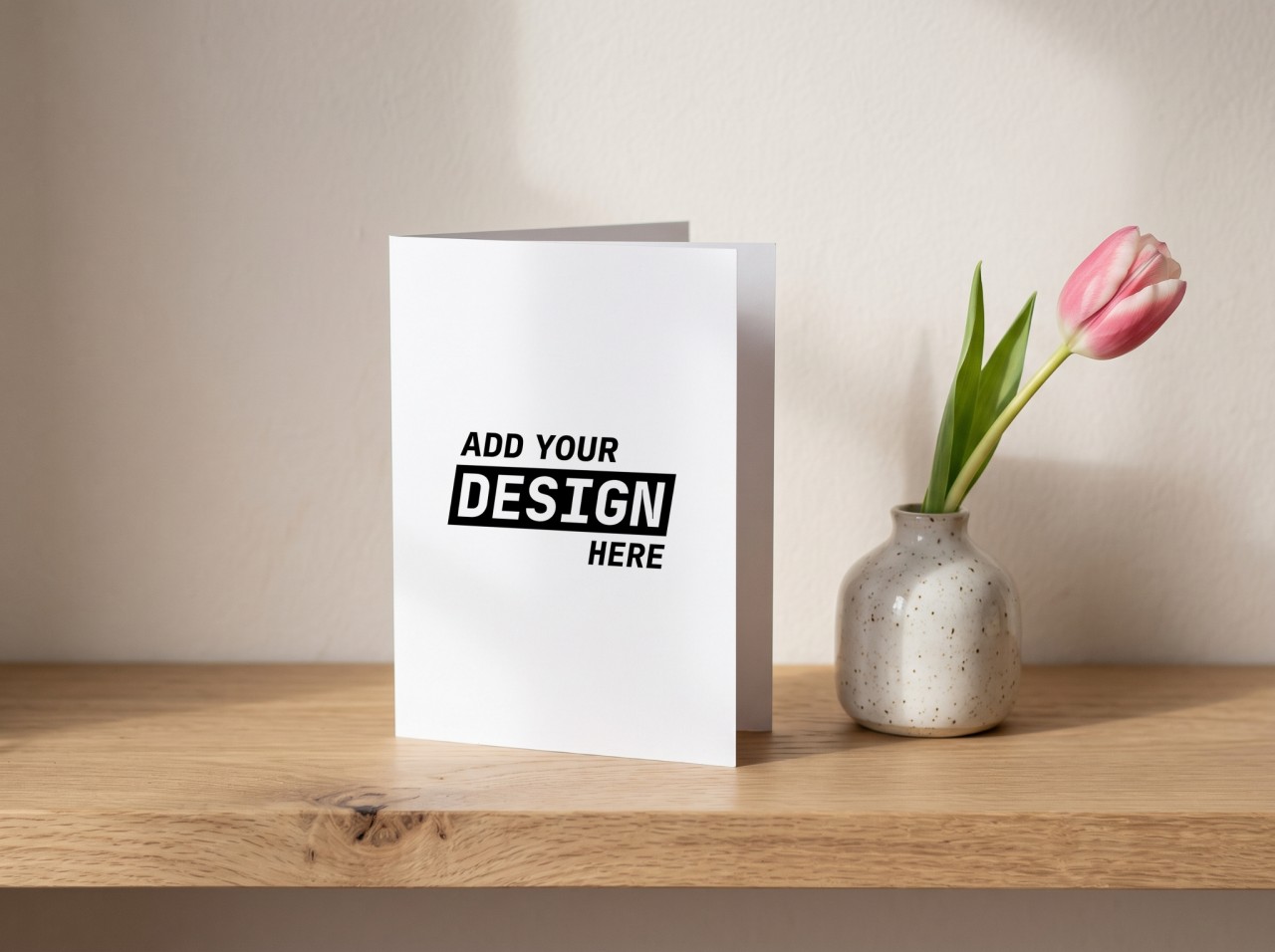Standing Greeting Card Mockup on an Oak Shelf with a Tulip