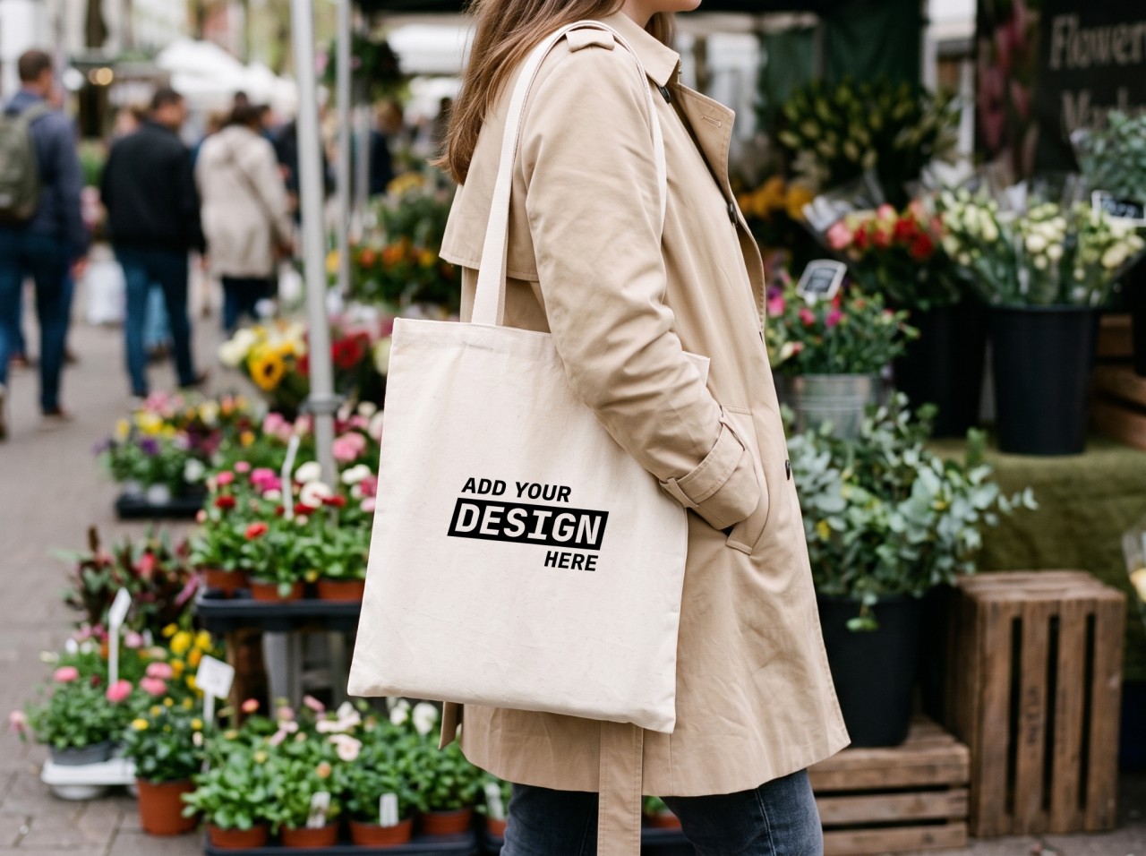 Natural Tote Bag Mockup on a Woman's Shoulder at a Flower Market