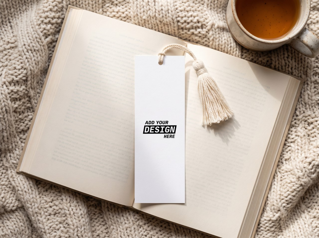 Paper Bookmark with Tassel Mockup on an Open Book