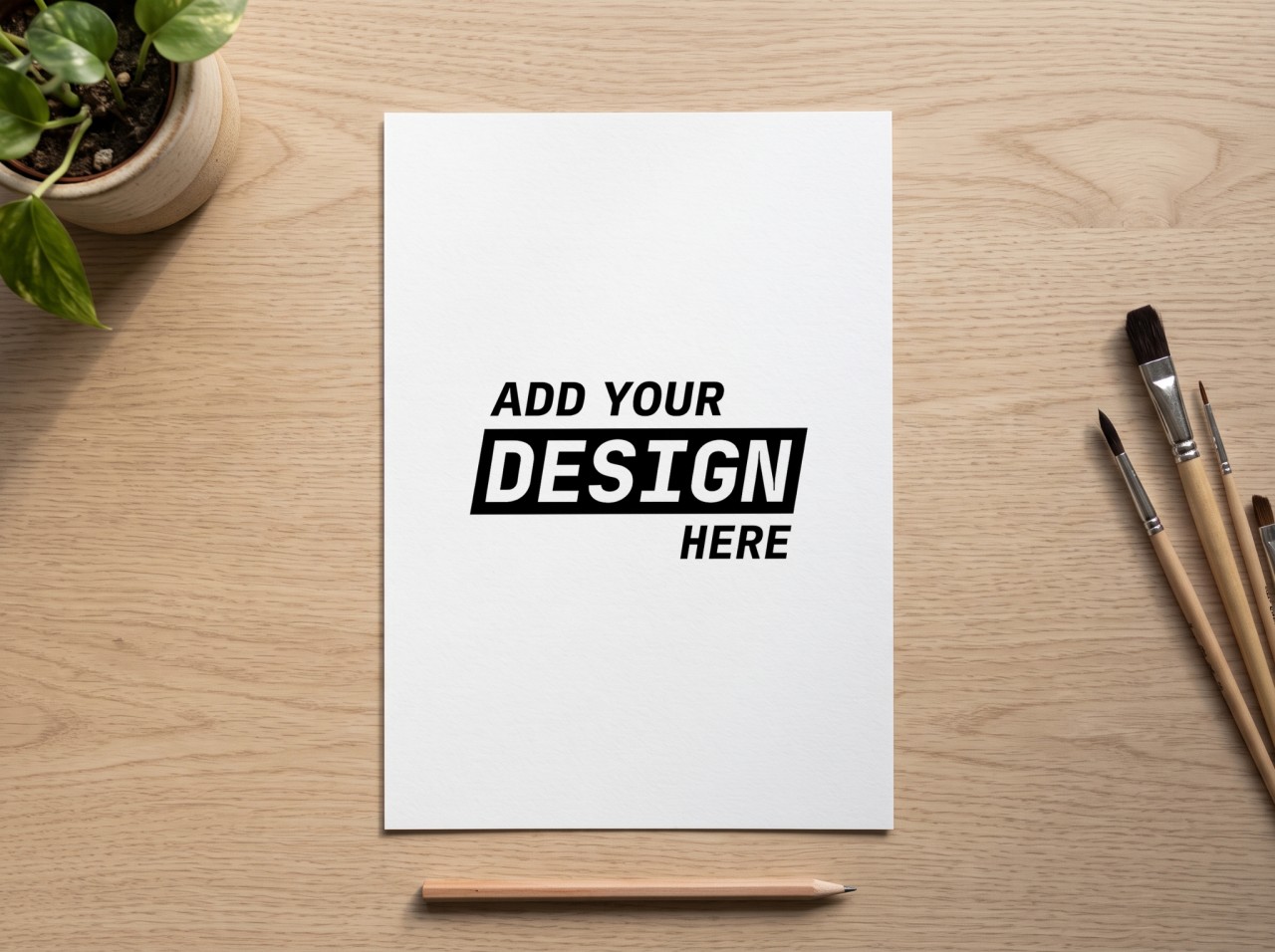 White A4 Art Print Mockup on an Oak Desk with Brushes