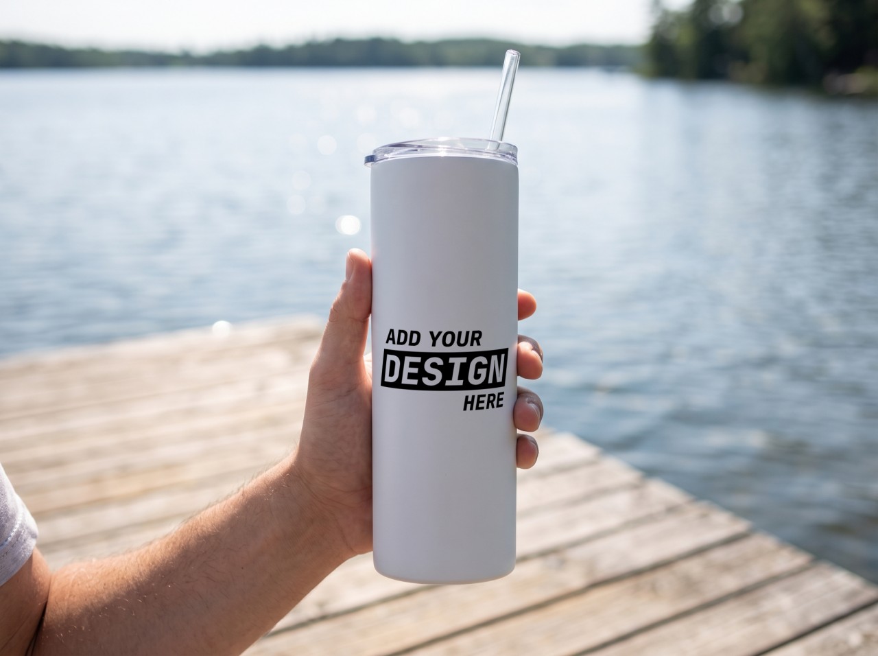 White Skinny Tumbler Mockup Held in a Hand on a Lake Dock