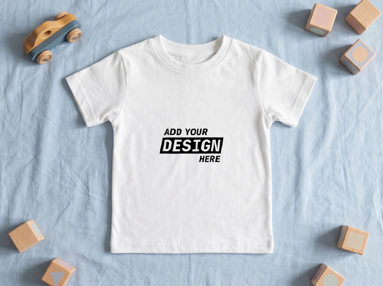 White Toddler T-Shirt Mockup Flat Lay with Wooden Toys