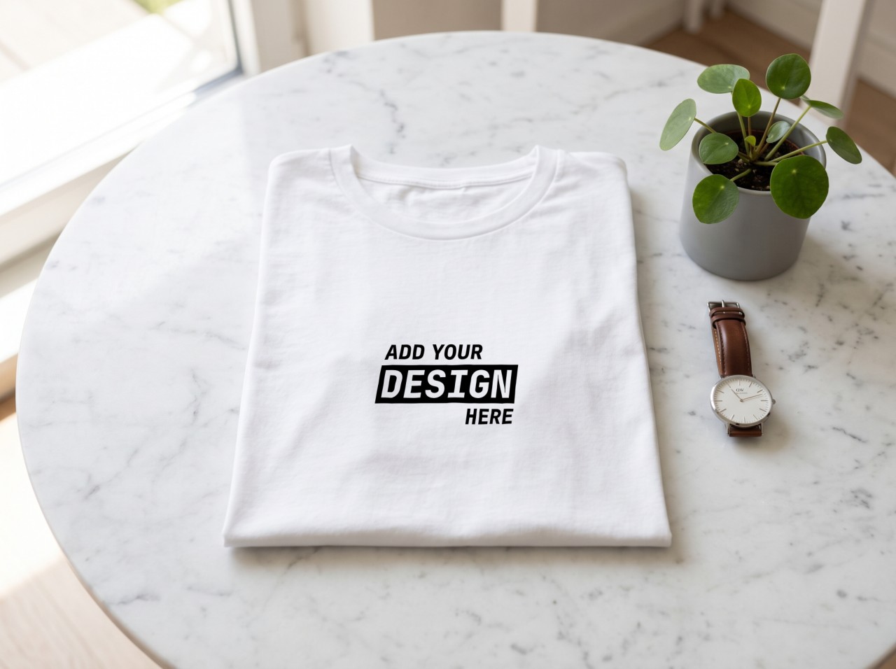 Folded White T-Shirt Mockup on a Marble Table