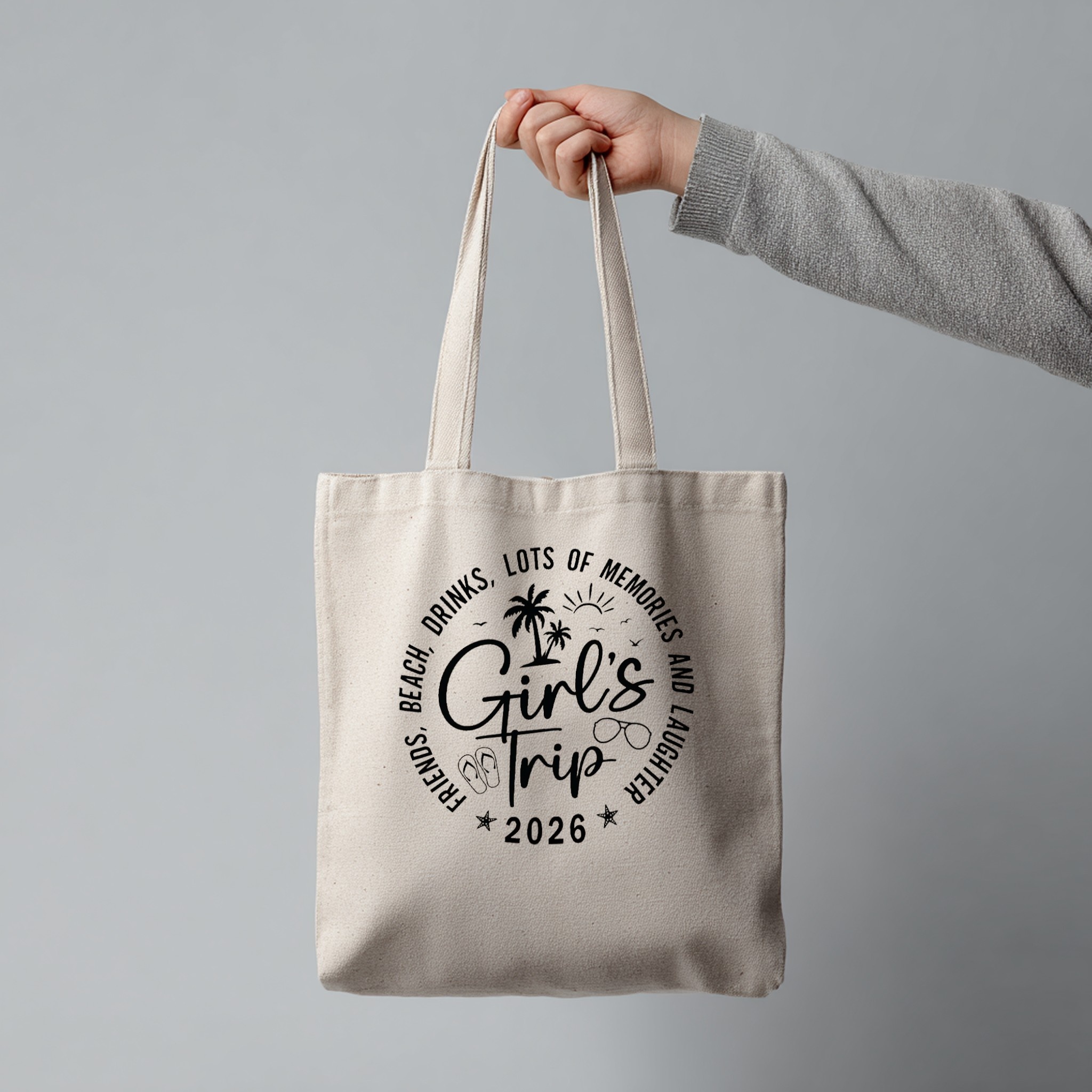 Tote bag with custom design hanging on grey background — mockup example